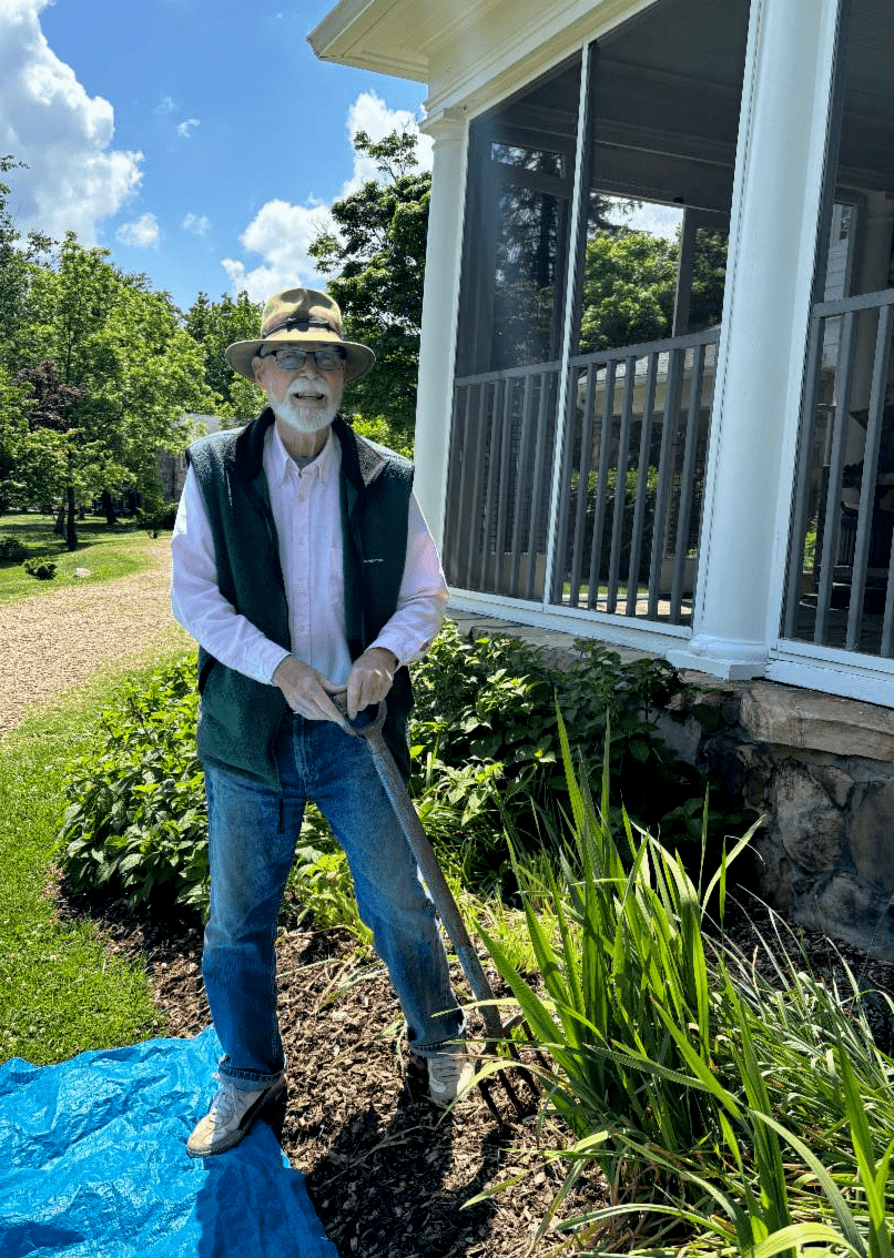 Larry Mick, longtime volunteer, in the gardens at McCoy Farm and Gardens